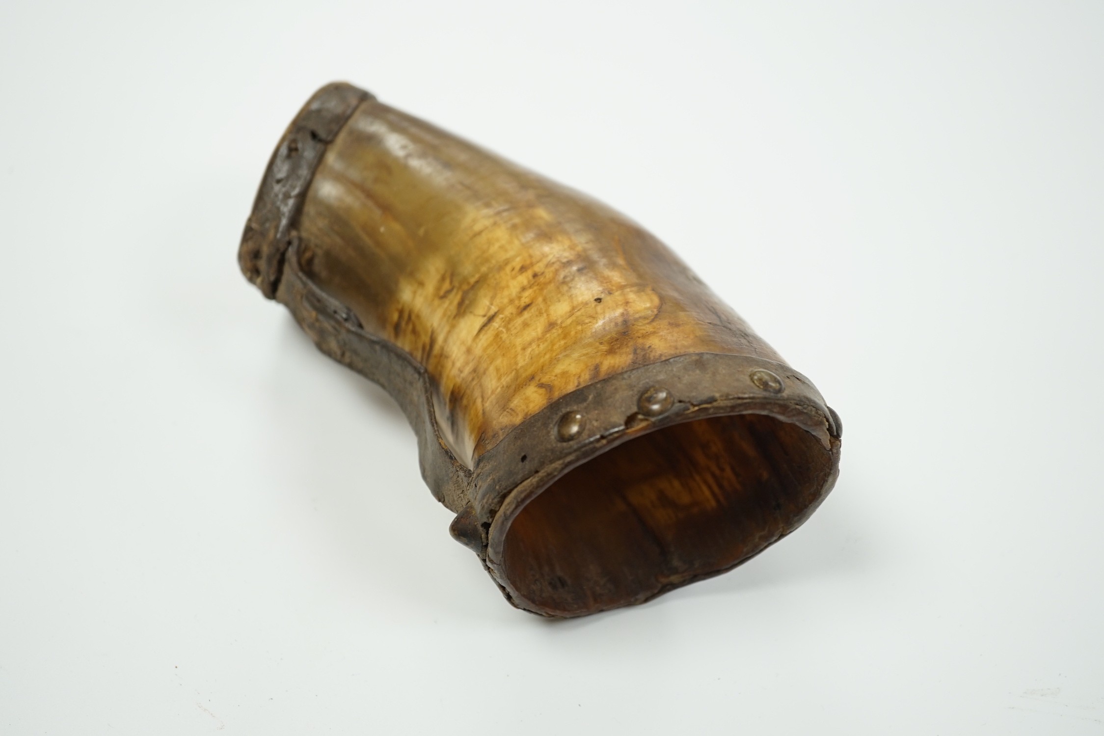 A 19th century ox horn and leather mounted cup, 19cm